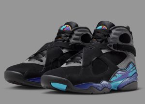 Air Jordan 8 “Aqua” shoe in black with aqua and purple accents, shown from a side angle